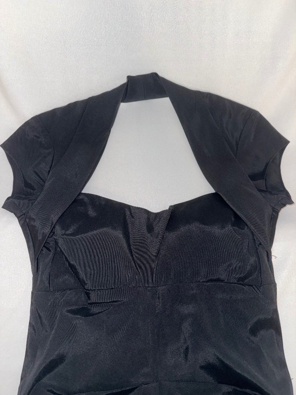 Cache black satin halter dress with tie back detail, rouched body, size S.